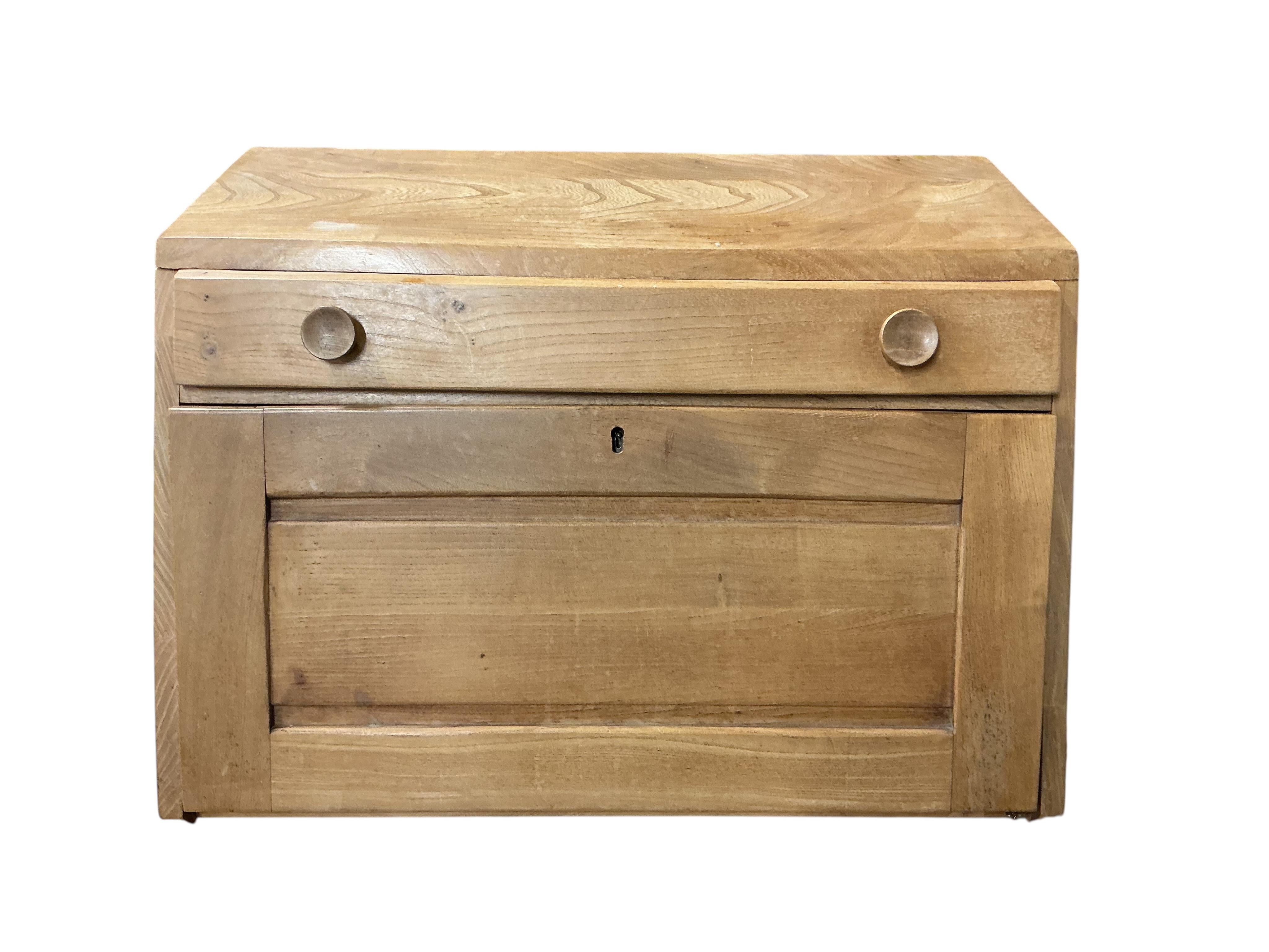 An Ercol elm writing cabinet, width 83cm, depth 42cm, height 37cm
